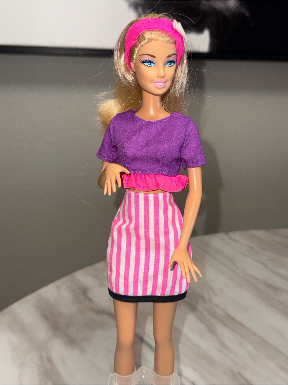 Barbie Mattel 1998 blonde doll wearing 1990’s colorful two piece outfit